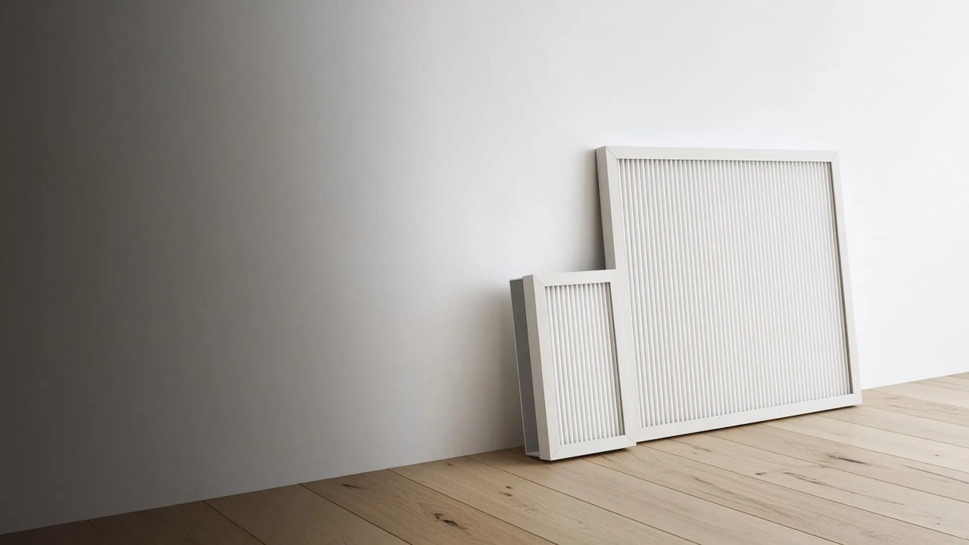 A furnace filter and an air purifier filter side by side