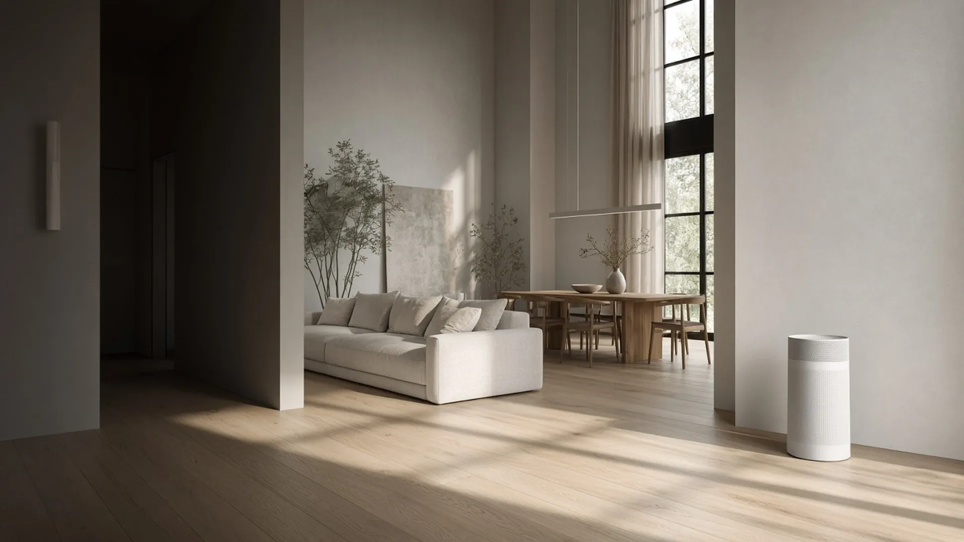 An open-plan living room with one plain air purifier